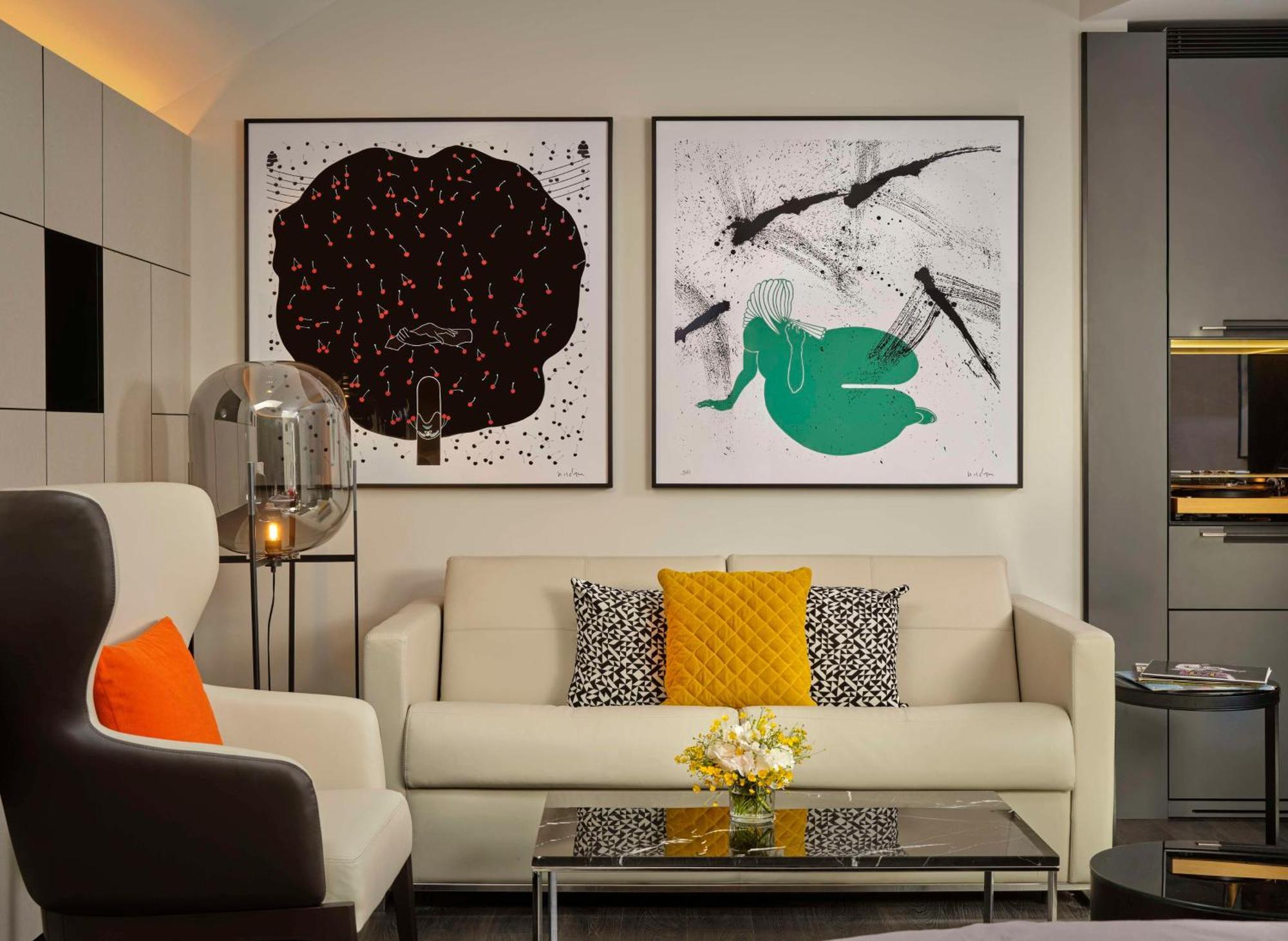 Art'Otel Zagreb, Powered By Radisson Hotels Esterno foto A living room with a sofa